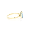 ANILLO EN ORO CON TOPACIO AZUL