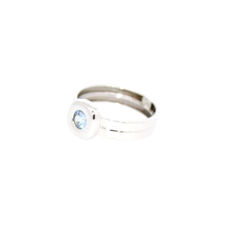 ANILLO EN ORO BLANCO CON TOPACIO AZUL