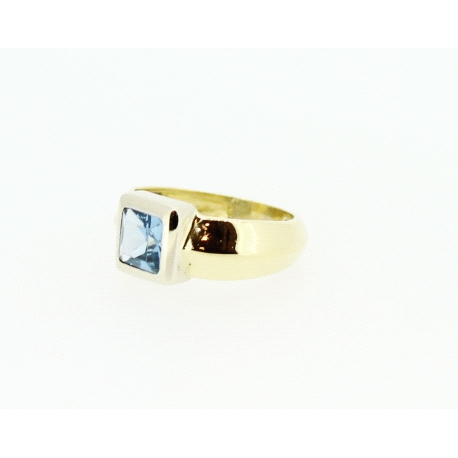 ANILLO EN ORO DE 18KT CON TOPACIO AZUL