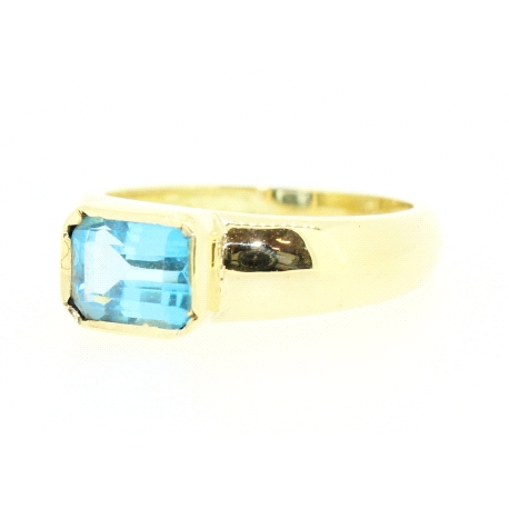 ANILLO EN ORO DE 18KT CON TOPACIO AZUL