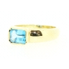 ANILLO EN ORO DE 18KT CON TOPACIO AZUL