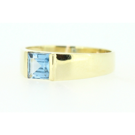 ANILLO EN ORO DE 18KT CON TOPACIO AZUL