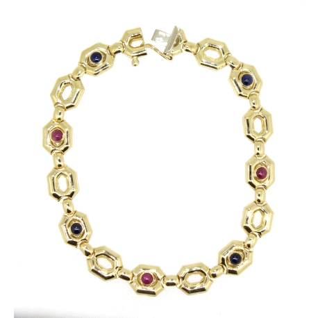 PULSERA DE DISEÑO EN ORO 18K CON RUBIES Y ZAFIROS Y CIERRE CAJA