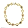 PULSERA DE DISEÑO EN ORO 18K CON RUBIES Y ZAFIROS Y CIERRE CAJA