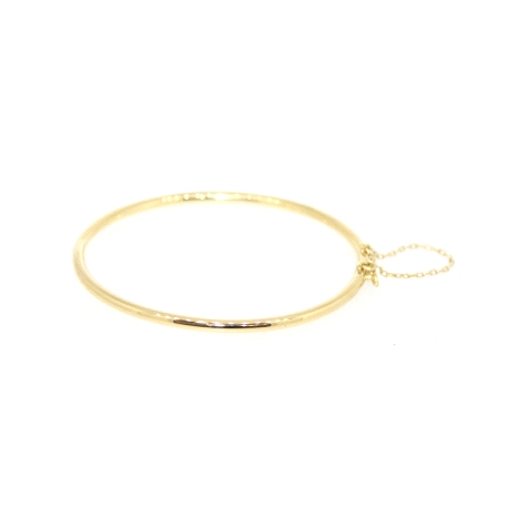 PULSERA RIGIDA EN ORO 18K CON CADENA DE SEGURIDAD Y CIERRE CAJA