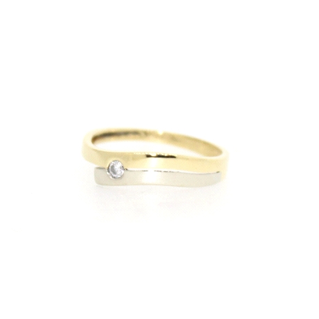 ANILLO EN DOS OROS 18K CON BRILLANTE DE 0.05 CT